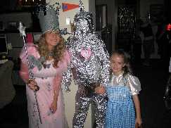 Glanda the Good Witch and Dorothy w Toto and the Tin Man